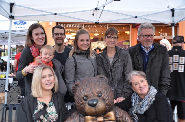 Lots of people with the teddy bear